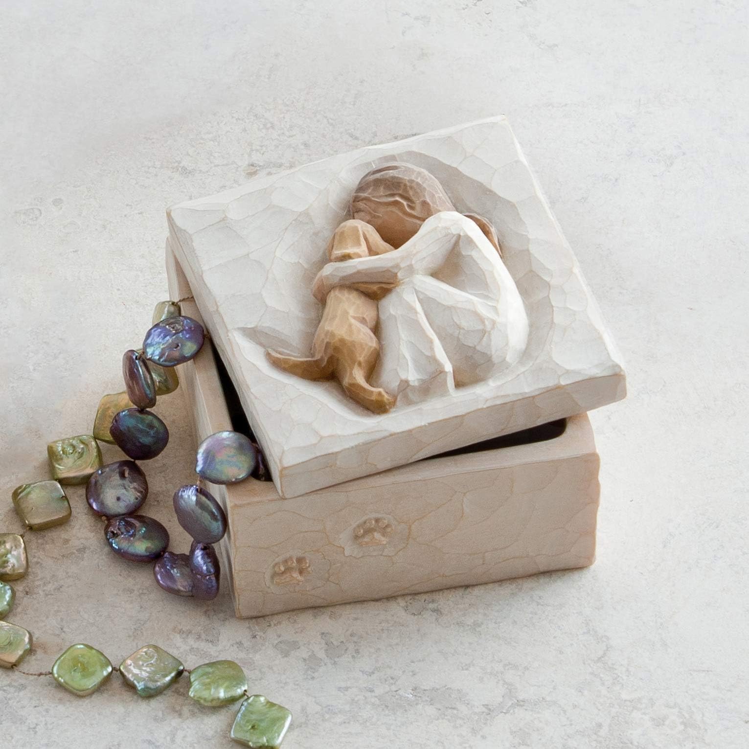 Willow Tree box next to ruler to show compact 3-inch scale for planning display