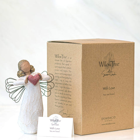 Willow Tree displayed on mantel in home setting adds warm decor appeal