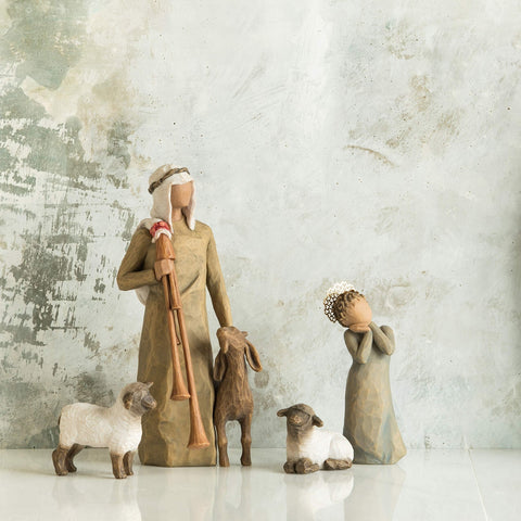 Willow Tree shepherd styled on mantel with other nativity pieces, inspiring seasonal decor