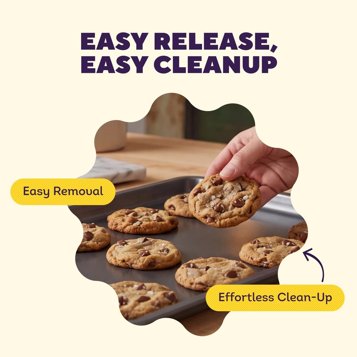 Wilton baking sheet with fresh cookies sliding off to show effortless release