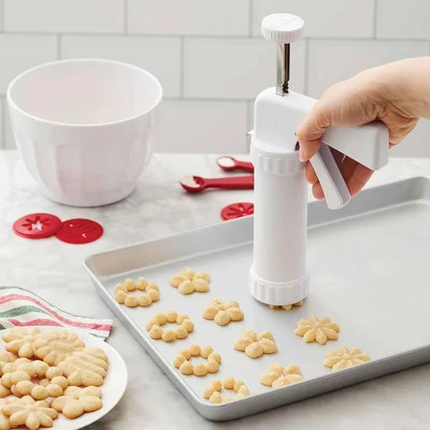 Wilton cookie press finished spritz cookies on a platter showcasing beautiful holiday variety
