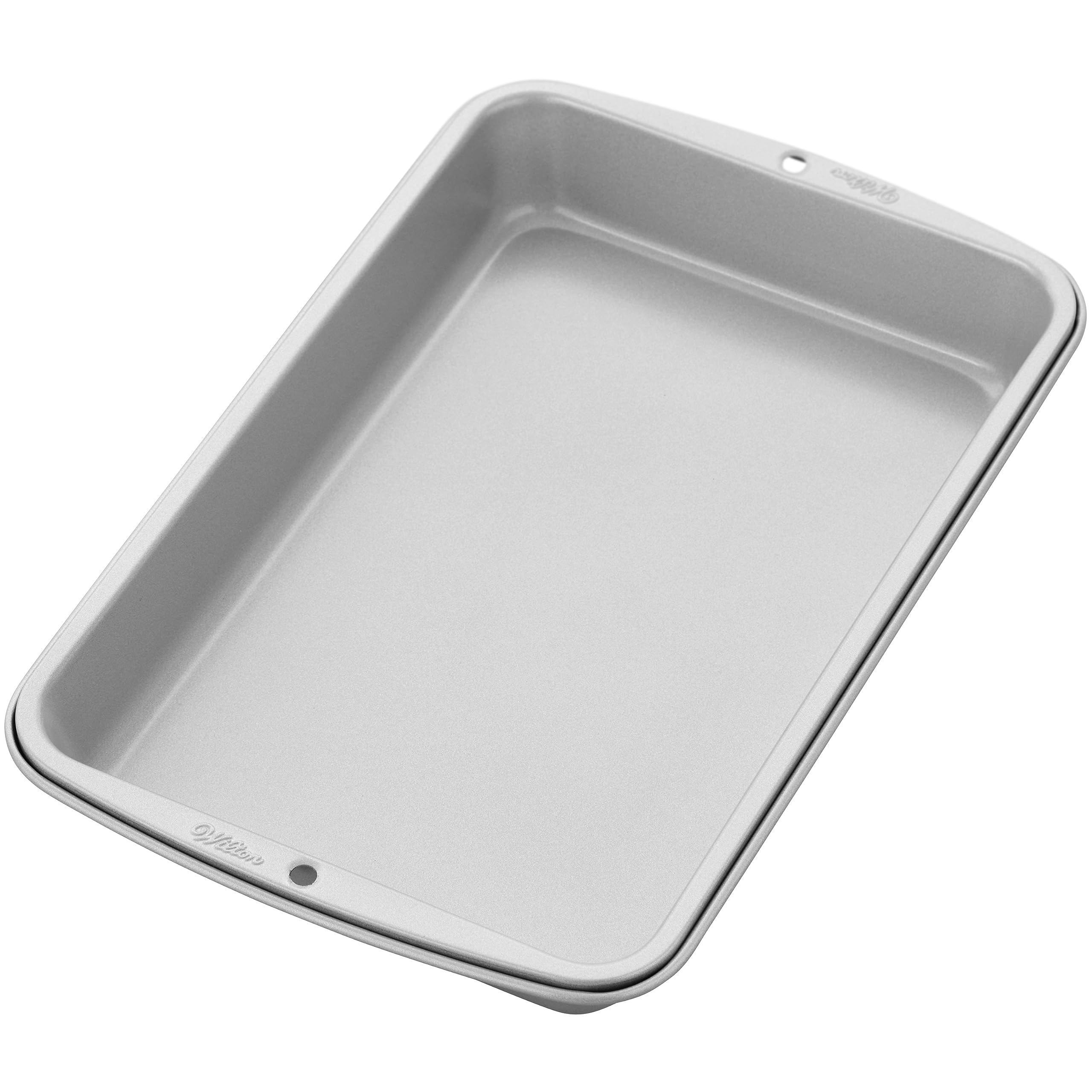 Wilton handle detail showing secure grip for safer oven transfers