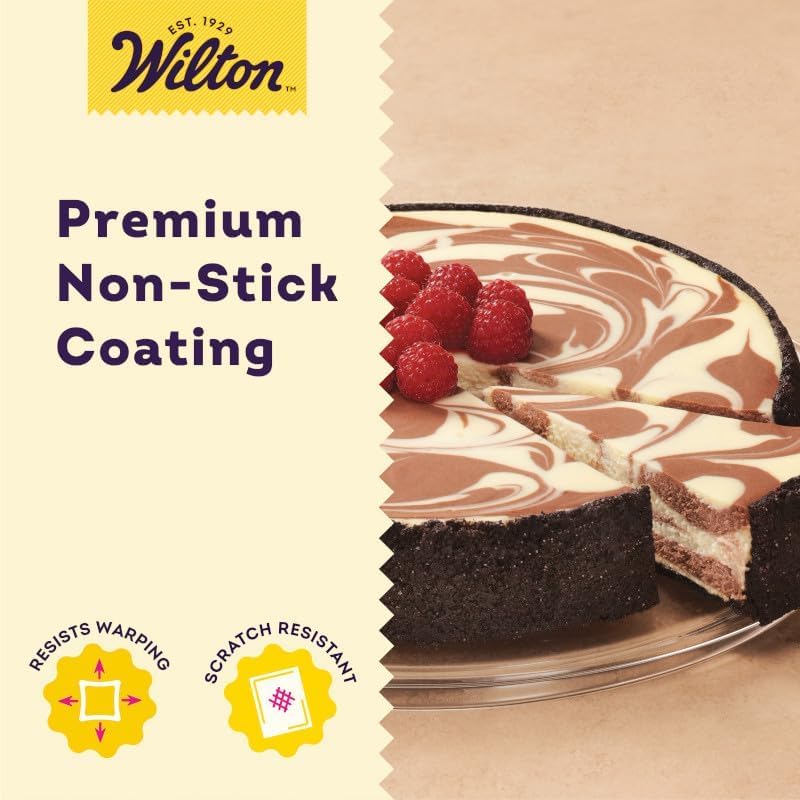 Wilton pan with cheesecake inside oven demonstrating even baking benefit