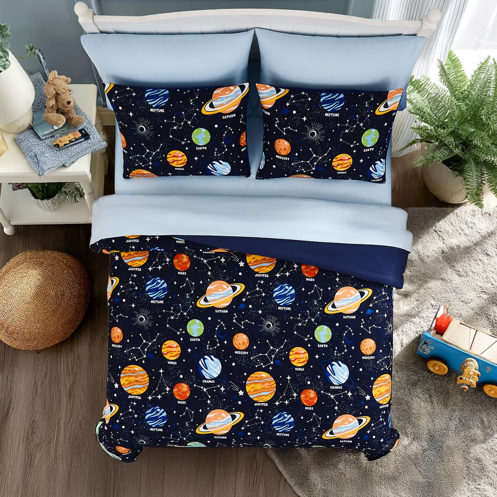 Wink Deer comforter styled on twin bed creating cozy space-themed bedroom