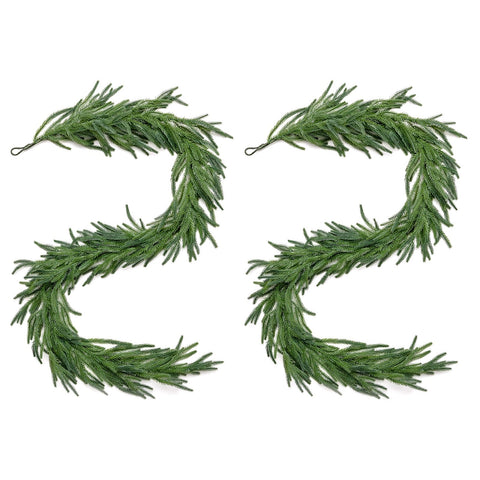 WISHSMILE garland wrapped around stair bannister providing continuous greenery