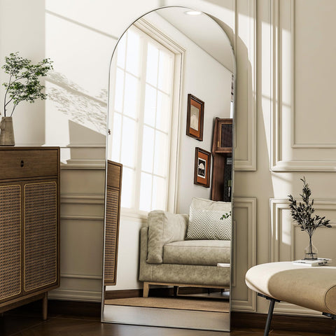 WISSMIELS mirror leaning in entryway creating vertical light and visual space