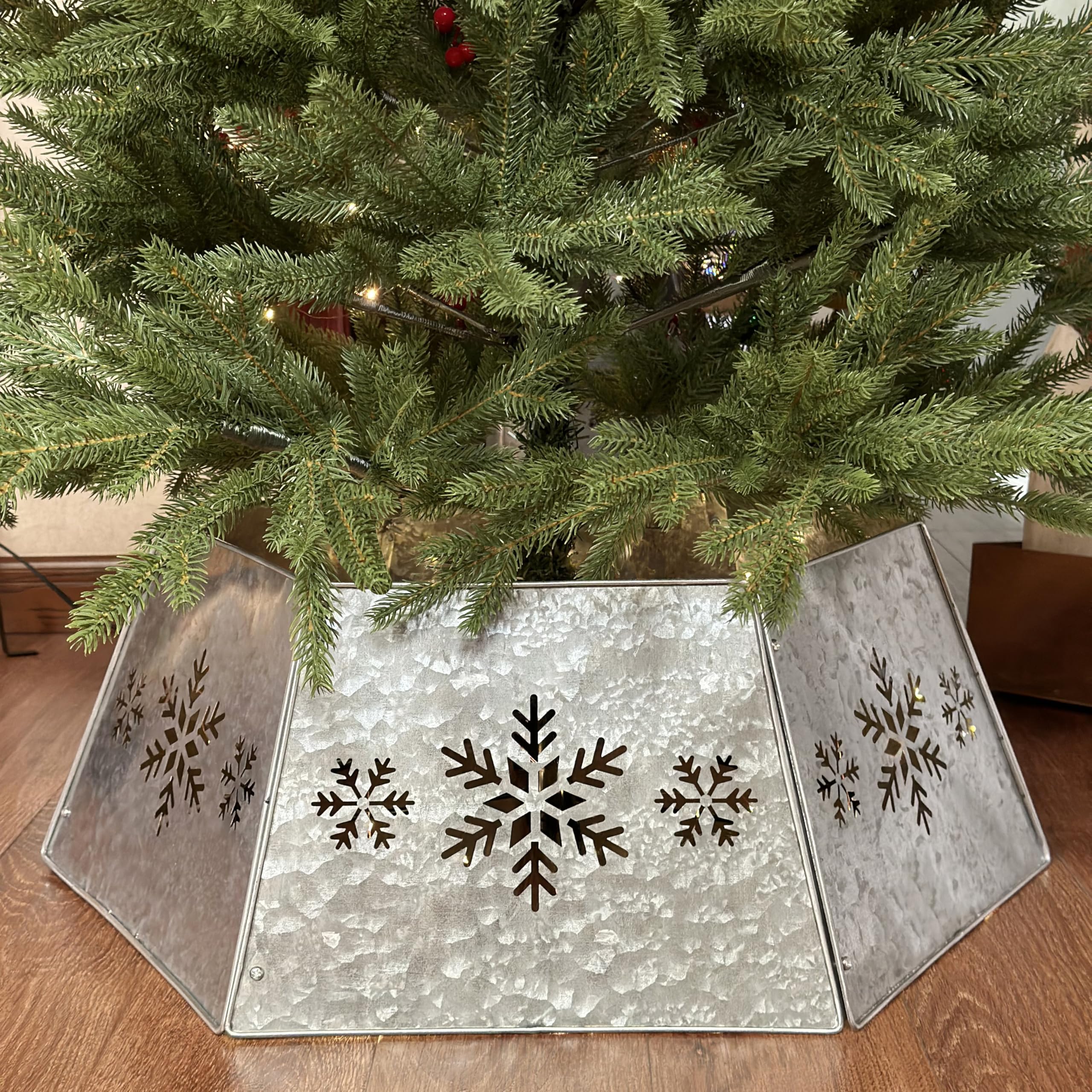 WKHOMEDECO front view of galvanized tree collar showing full snowflake design and tidy base concealment