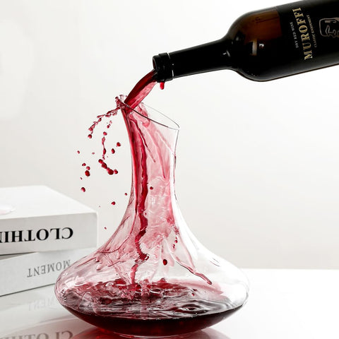 Wlasss decanter in use pouring wine cleanly for easier serving