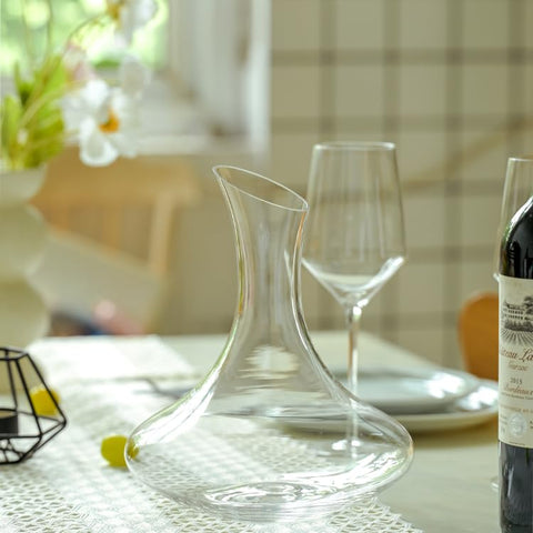 Wlasss next to standard wine bottle showing scale and 1100ml capacity benefit