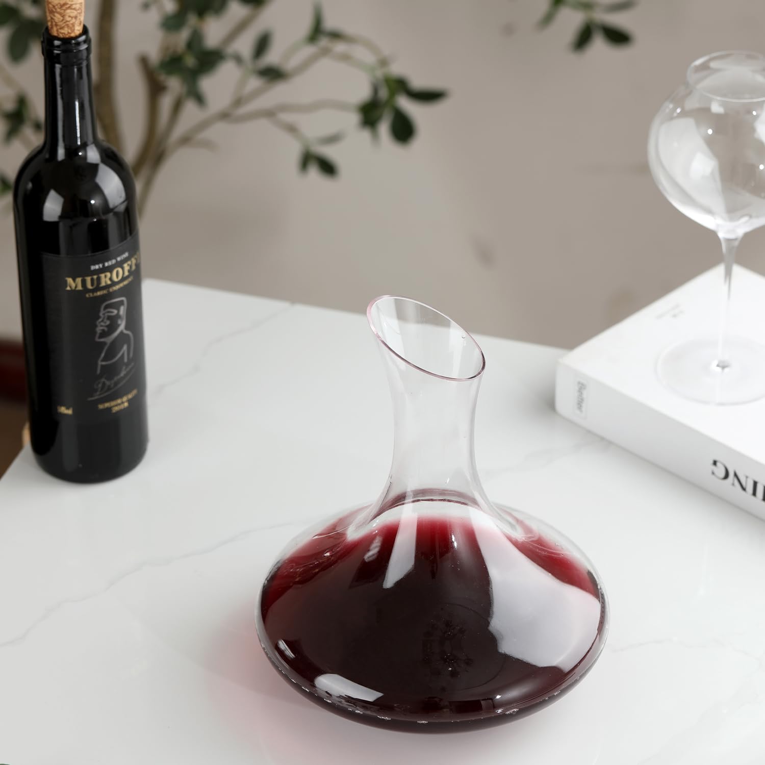 Wlasss decanter beside a wine bottle showing 1900ml scale advantage