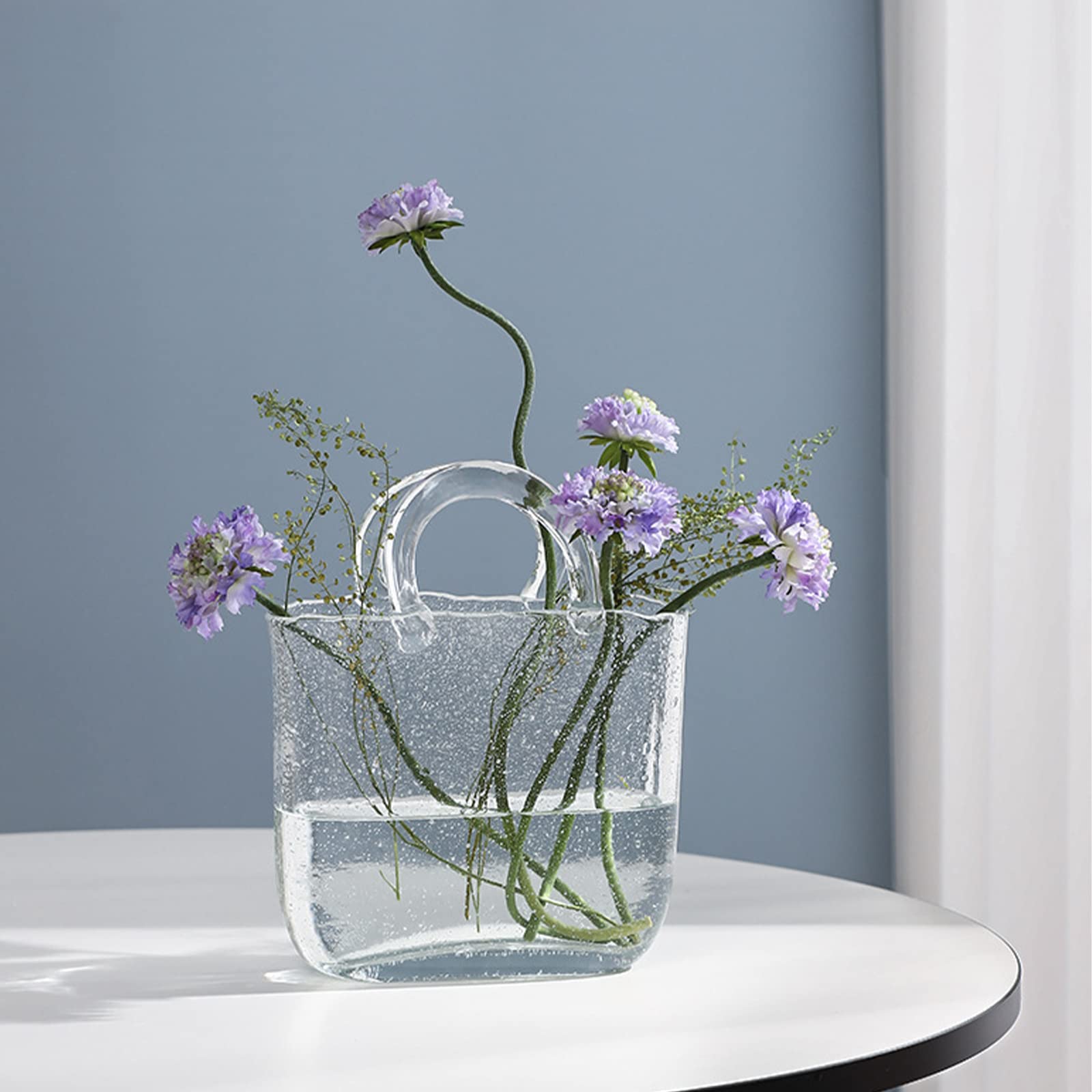 WMM purse vase used as small fishbowl demonstrating multipurpose decor and cozy ambiance benefit