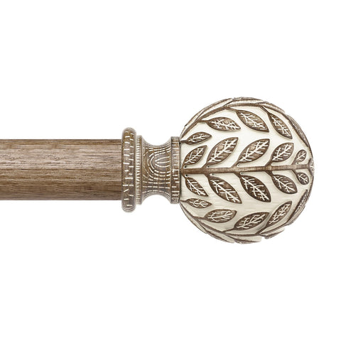 Wolistsa front view of full curtain rod showing boho leaf finials and balanced design