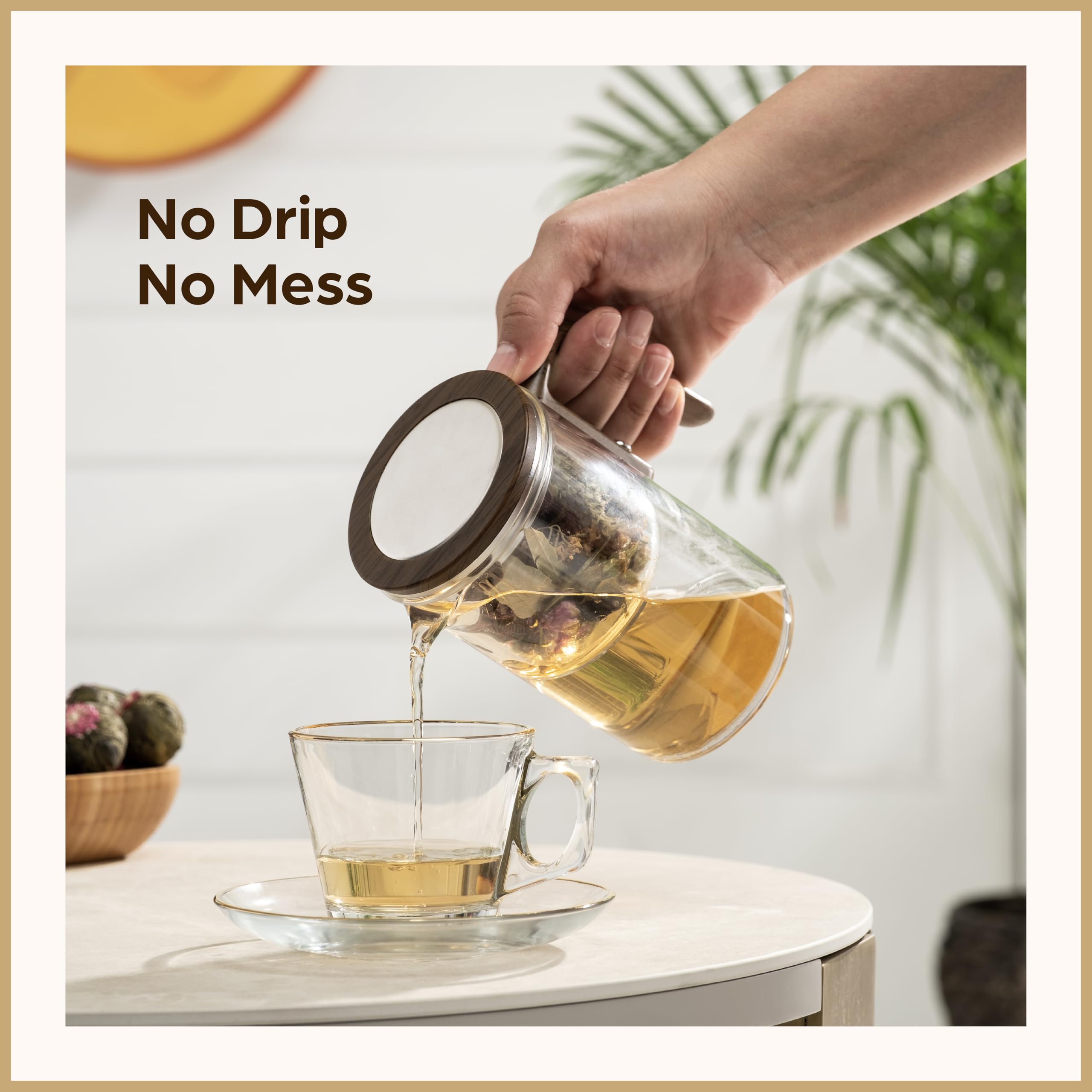WOLTBLOOM blooming tea inside glass teapot showcasing leaf unfurling