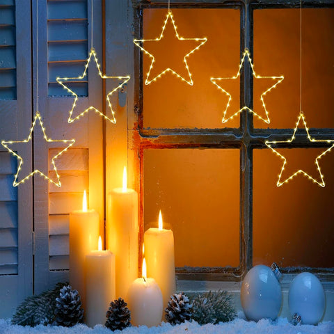 wominoy front packaging showing five battery-operated star lights and remotes for easy setup