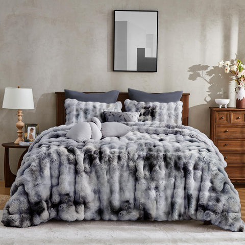 Wonderful front view of king comforter showing full grey tie-dye coverage and drape for elegant warmth