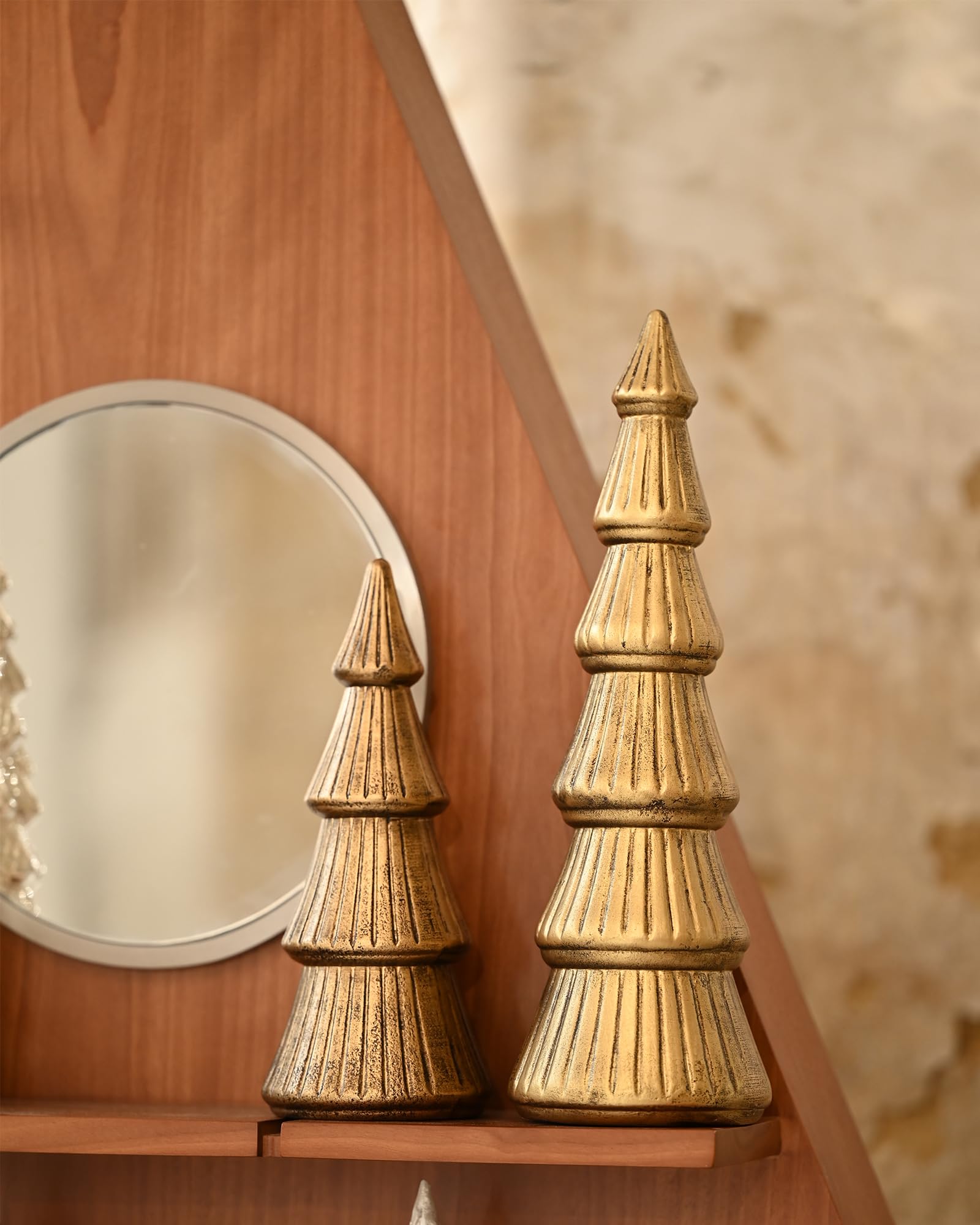 WONDROUS' DECO front view of two gold wooden trees showing elegant finish and balance