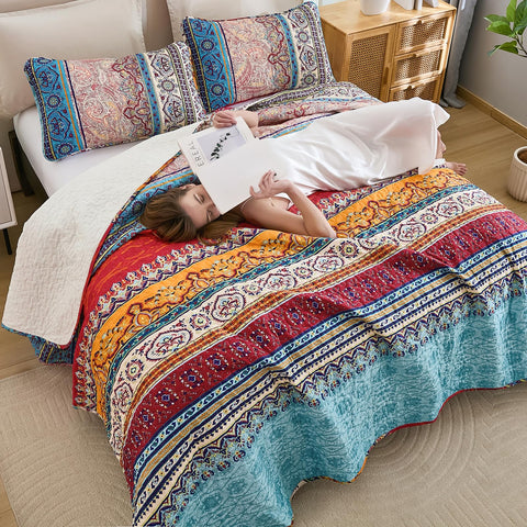 WONGS BEDDING quilt on king mattress for scale, ensures generous overhang