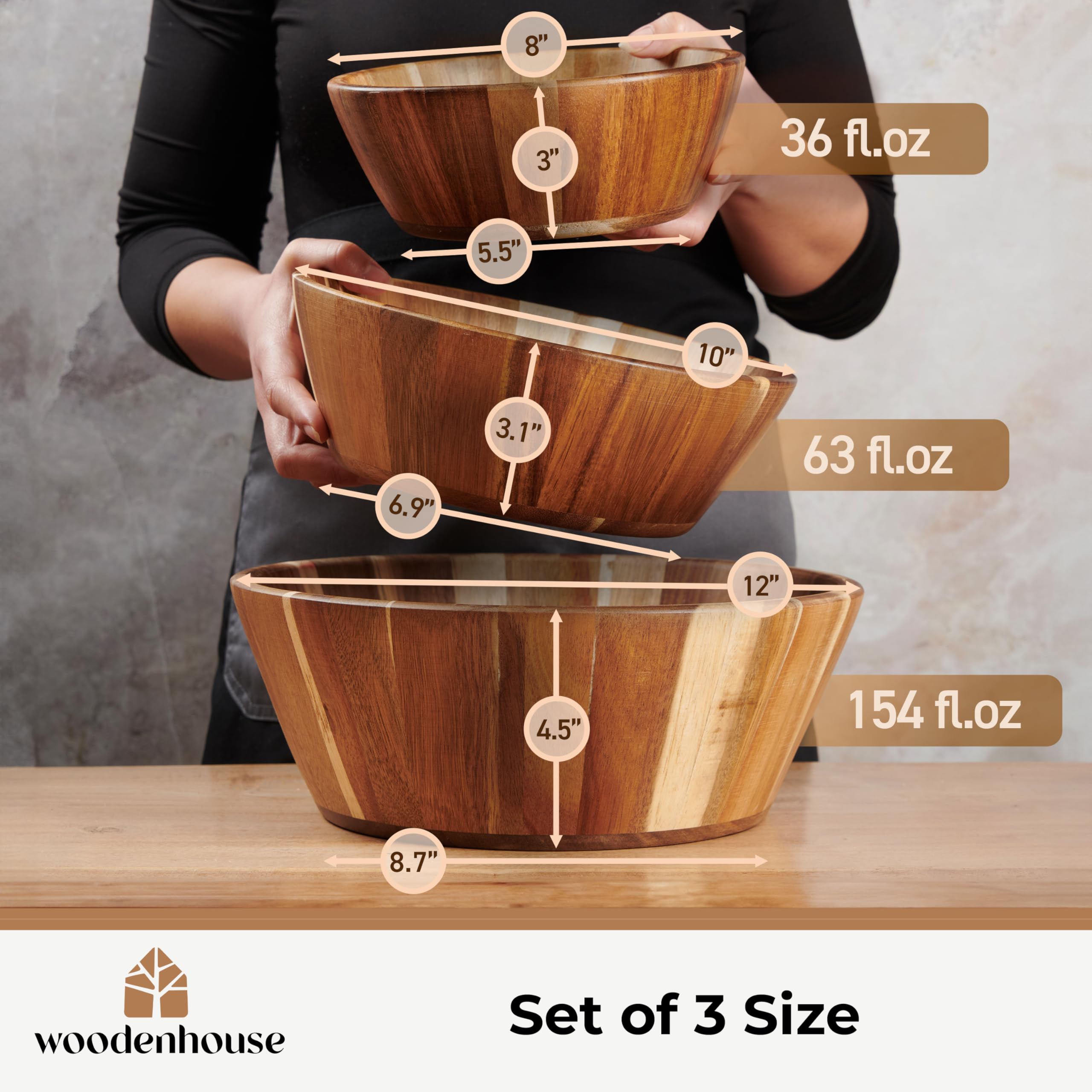 Woodenhouse 8-inch bowl held in hand demonstrating compact size and practical scale