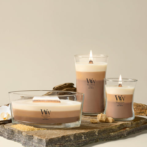 WoodWick graphic illustrating up to 50 hours burn time for long-lasting use