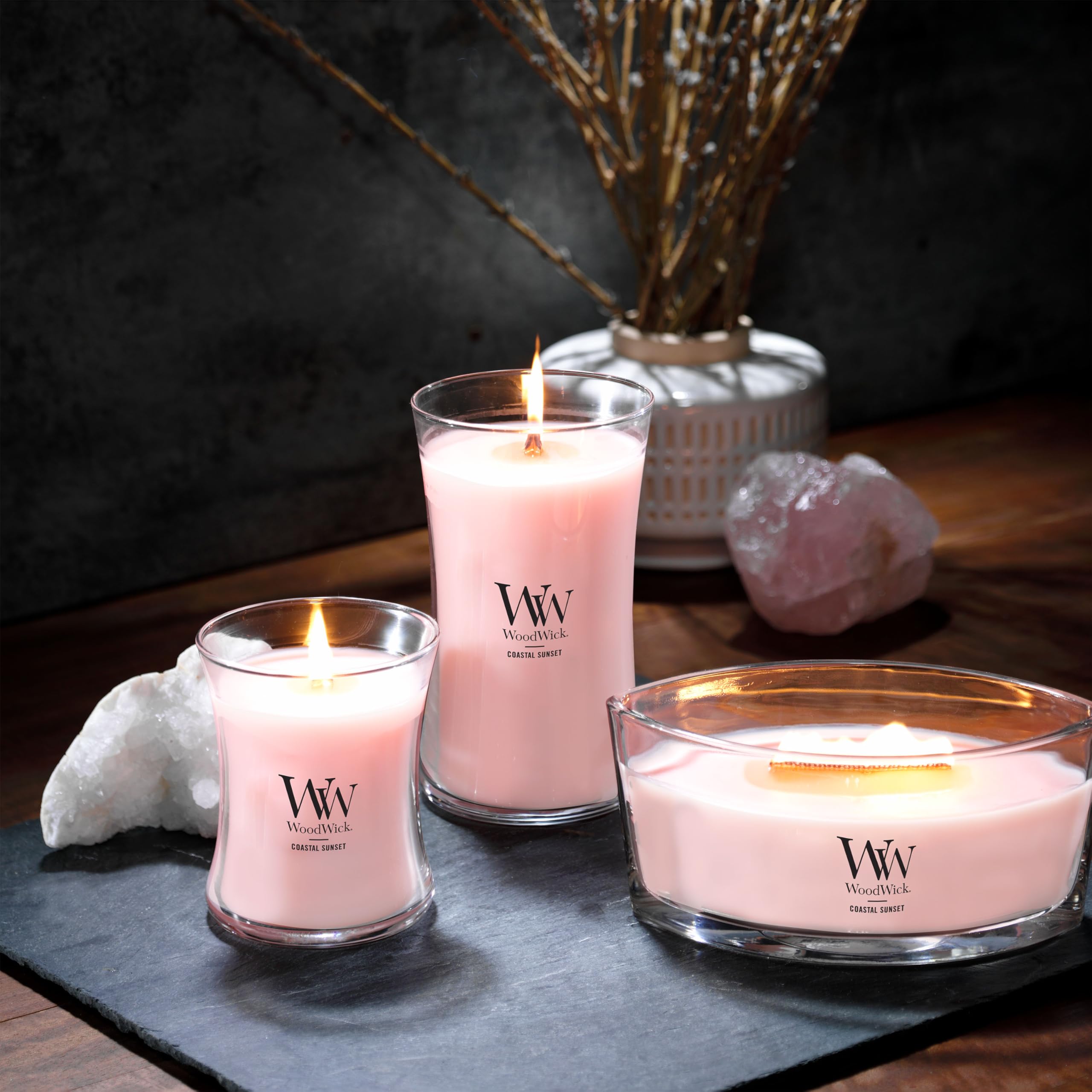 WoodWick candle burning with Pluswick crackle creating cozy ambient sound
