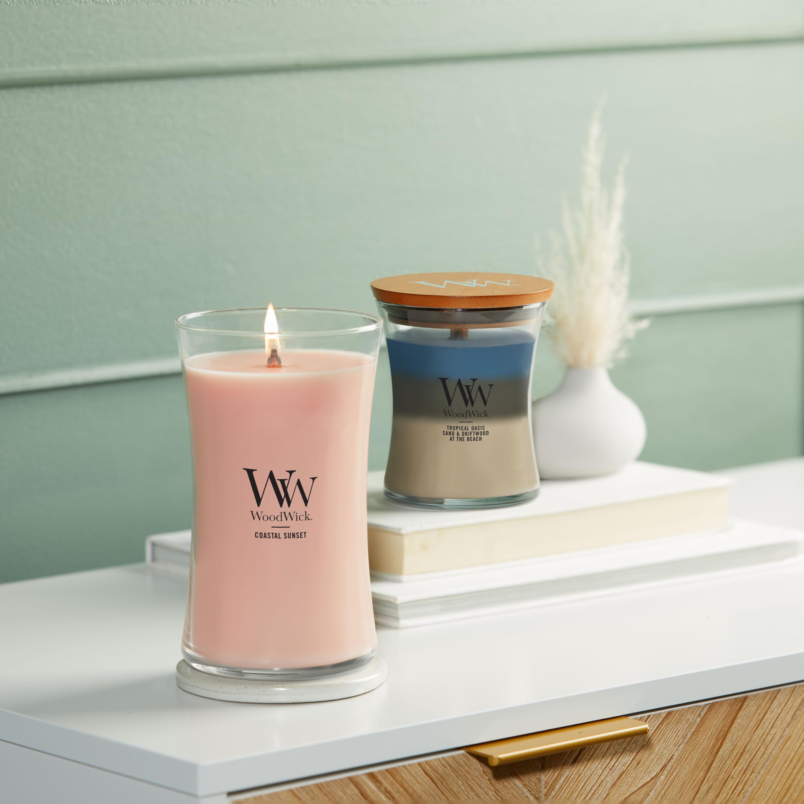 WoodWick beside a ruler showing 21oz scale for size and long-lasting use