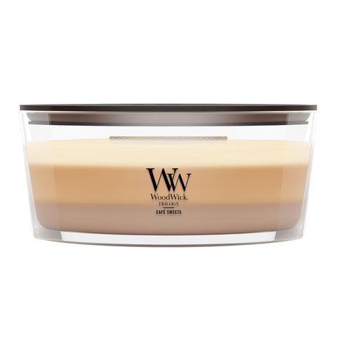 WoodWick front view showing Café Sweets candle and inviting decor benefit