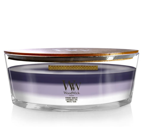 WoodWick front view of ellipse candle showing layered fragrance and elegant vessel