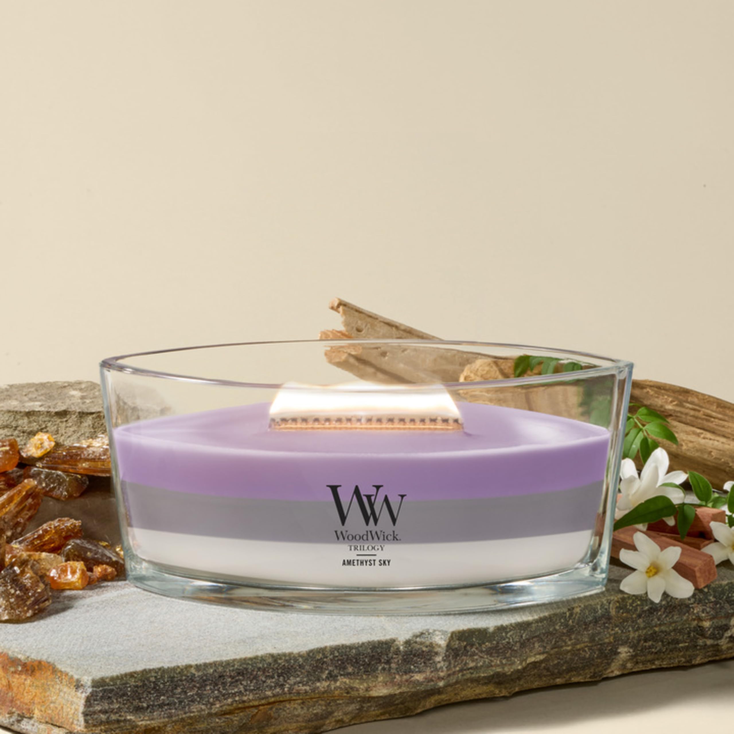 WoodWick close-up of wooden Hearthwick wick highlighting crackling flame ambiance benefit