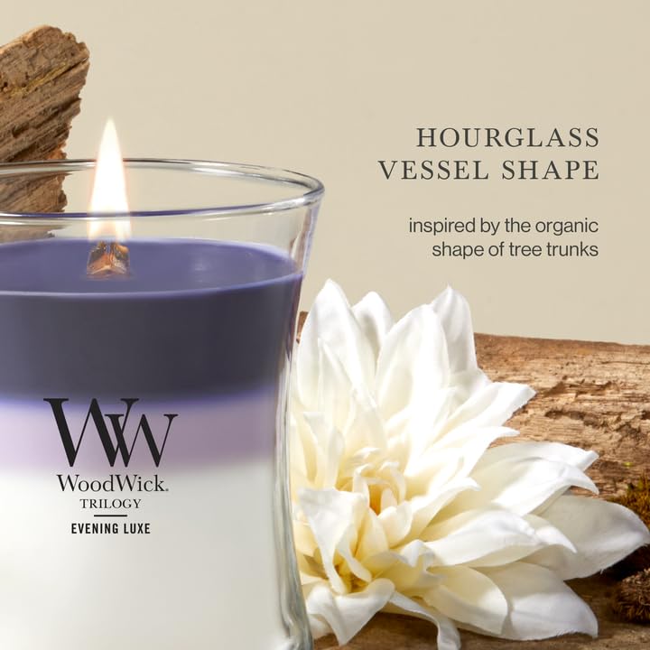 WoodWick Evening Luxe lit in a living room showing warm glow and relaxing atmosphere