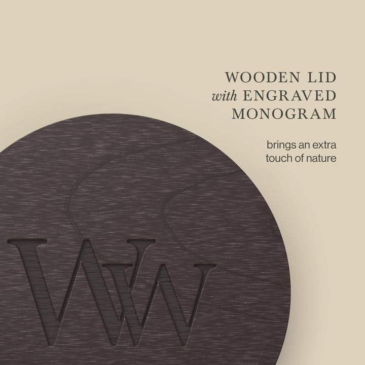 WoodWick medium hourglass candle held in hand showing scale and easy tabletop placement