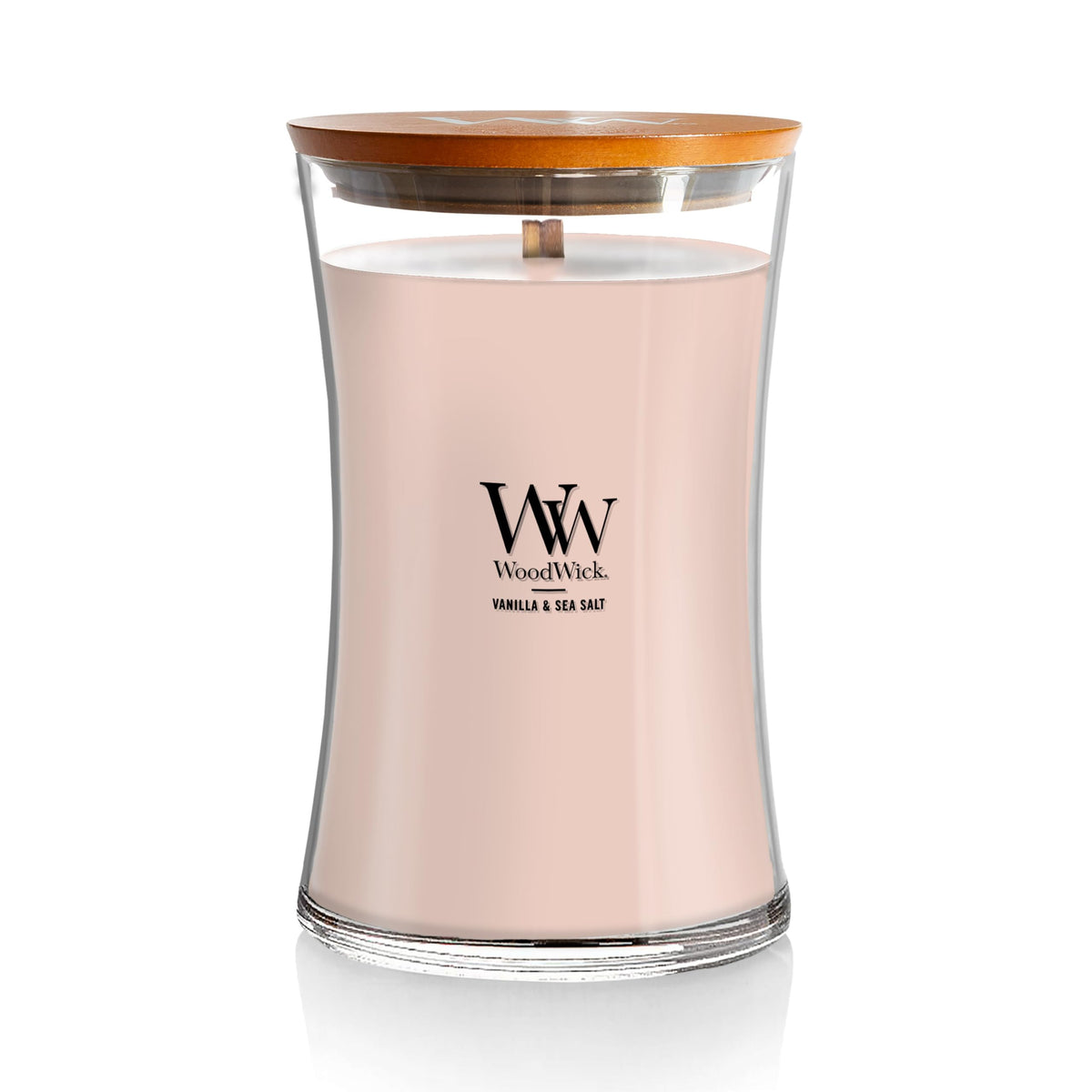 WoodWick hourglass front view showing elegant jar and warm glow benefit