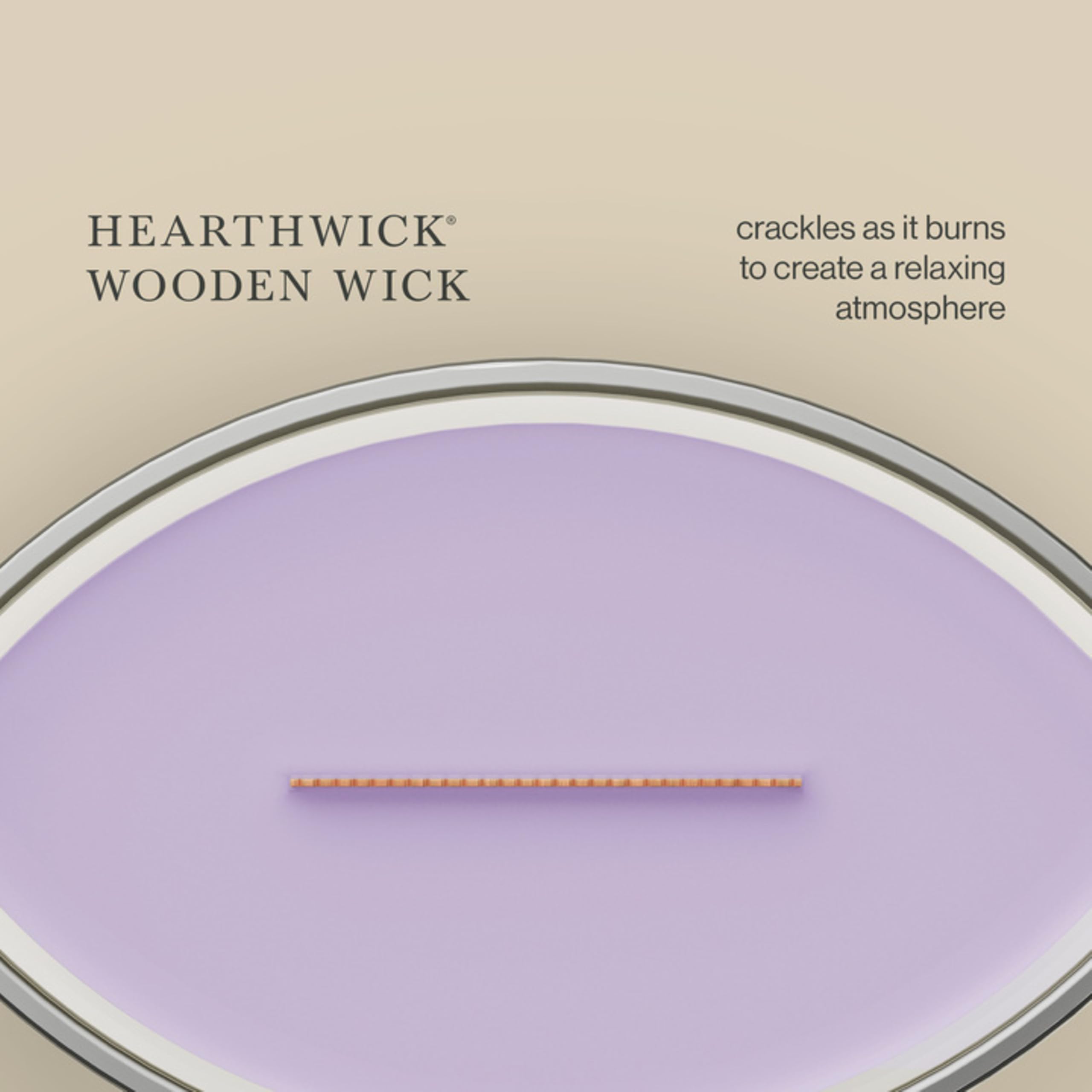WoodWick candle beside everyday objects showing 16 oz scale and presence