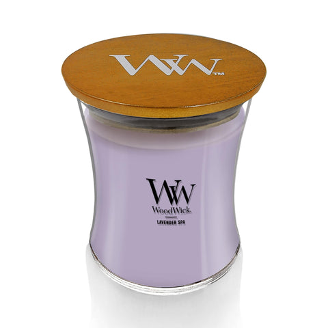 WoodWick hourglass jar angled label highlighting fragrance and elegant presentation benefit