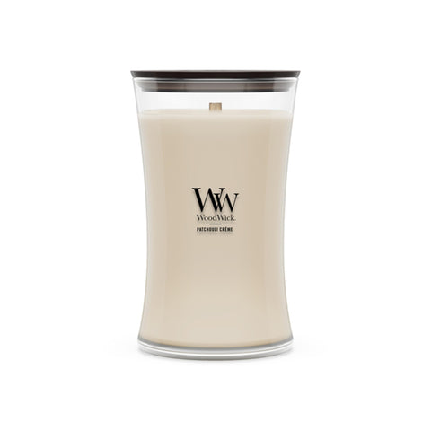 WoodWick Patchouli Crème front packaging showing hourglass jar and label benefit: stylish display