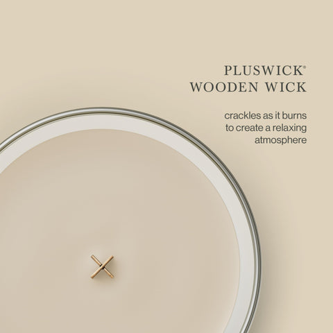 WoodWick Patchouli Crème jar profile showing flared glass design and elegant look benefit