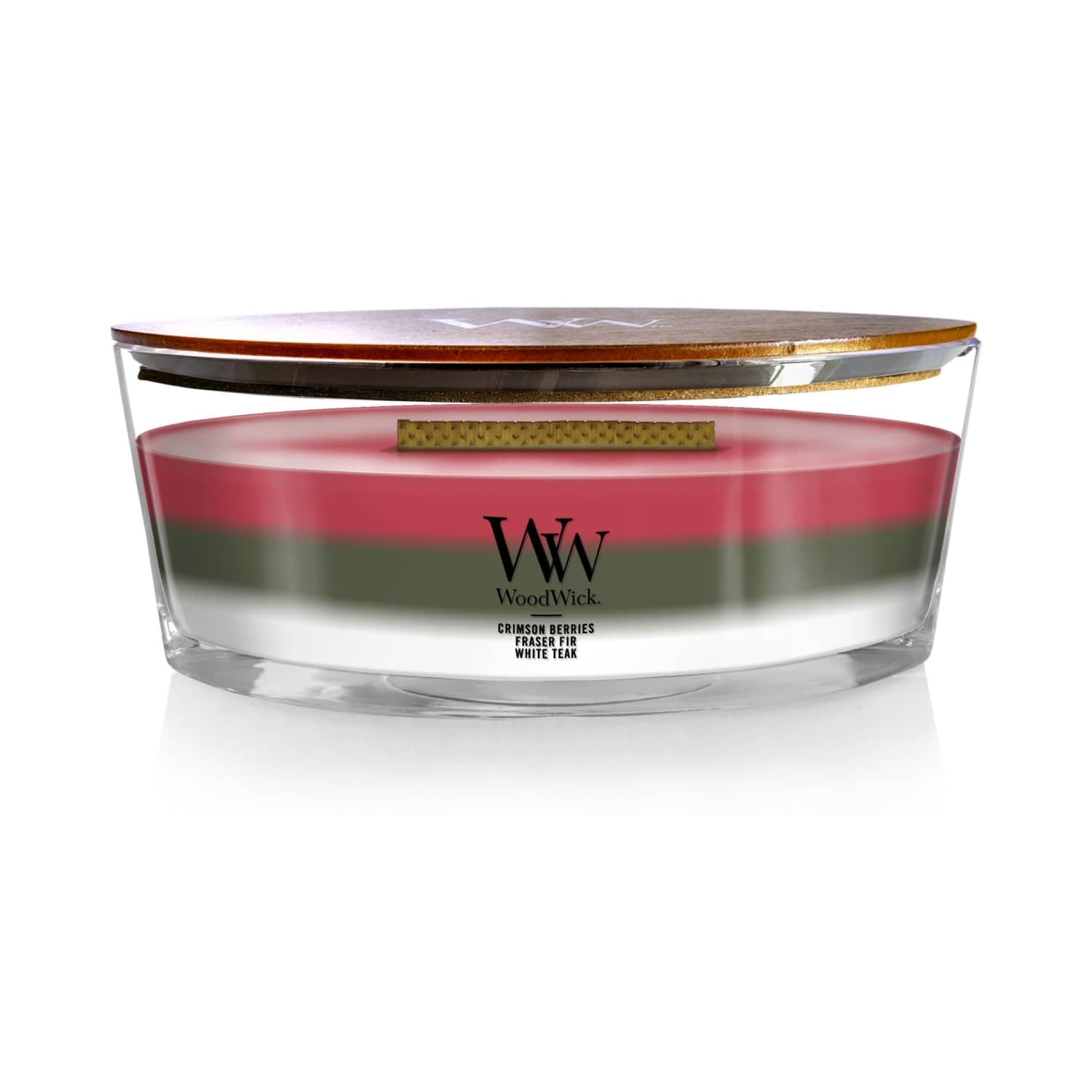 WoodWick front view of ellipse candle showing winter garland labels and festive look