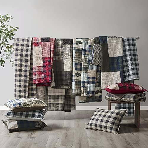 Woolrich folded flat lifestyle shot showing reversible convenience