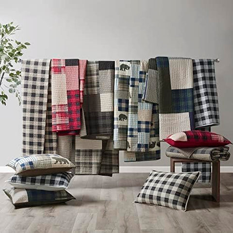 Woolrich folded flat lifestyle shot showing reversible convenience