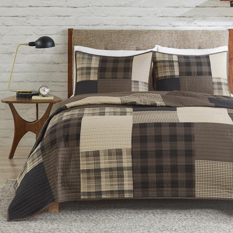 Woolrich front view showing Aztec and plaid mix for rustic style