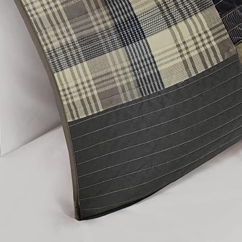 Woolrich on queen bed demonstrating oversized coverage and drape