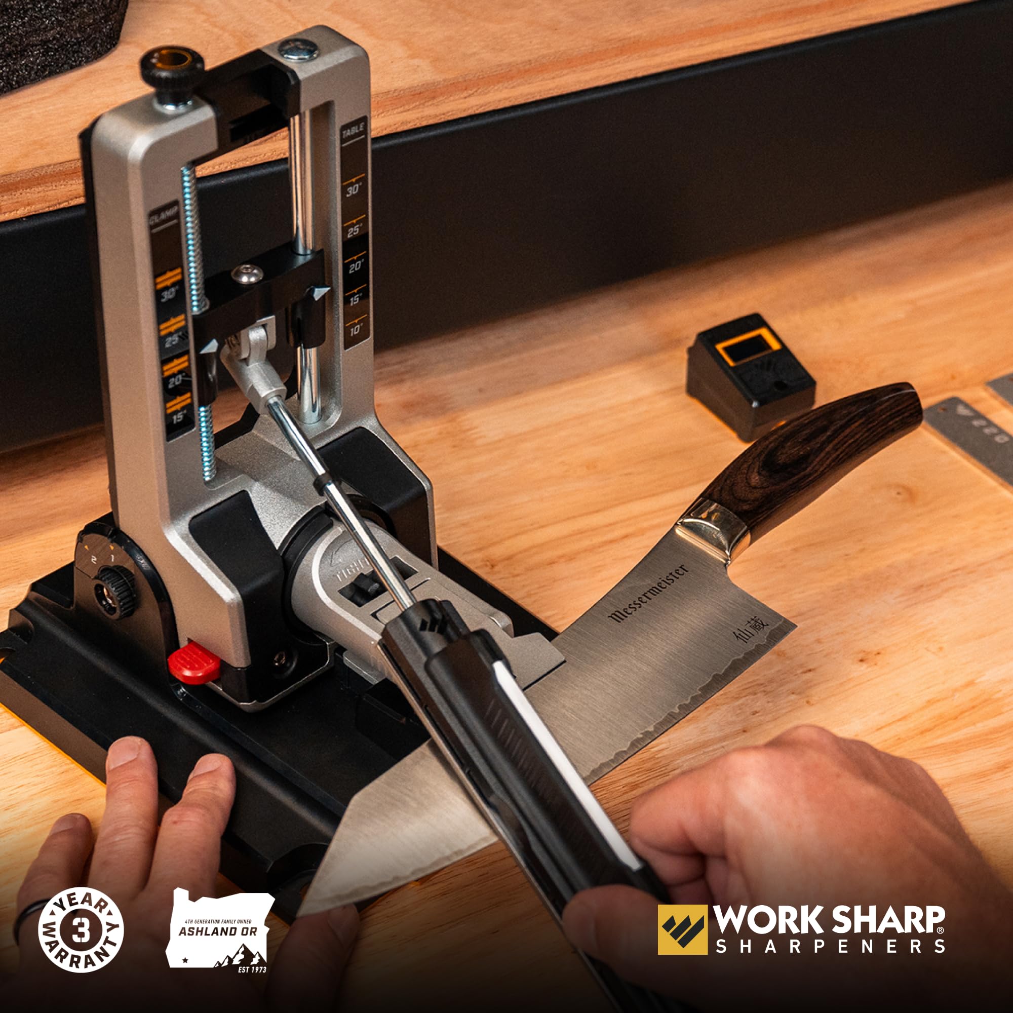 WORK SHARP unit sharpening a kitchen chef knife demonstrating controlled strokes and repeatable edge