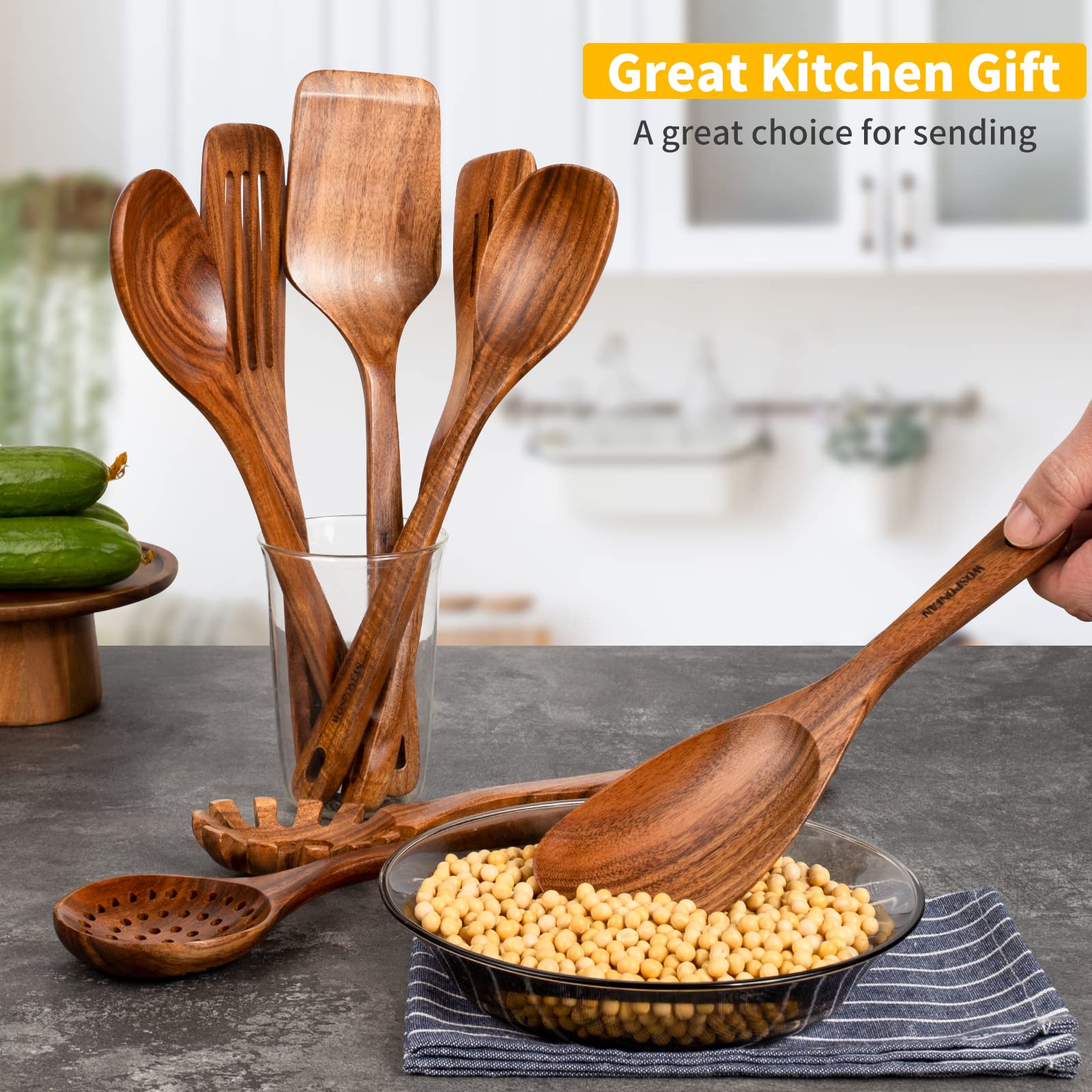wosponfan utensils held in hand to show scale and comfortable-weight benefit
