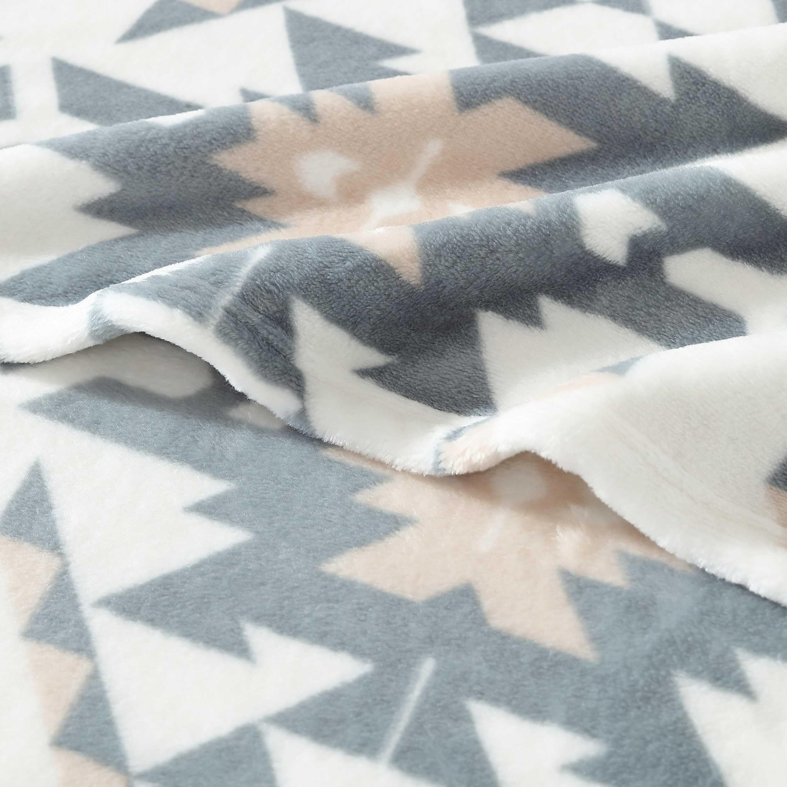 Wrangler fabric texture close-up highlighting soft polyester and durability