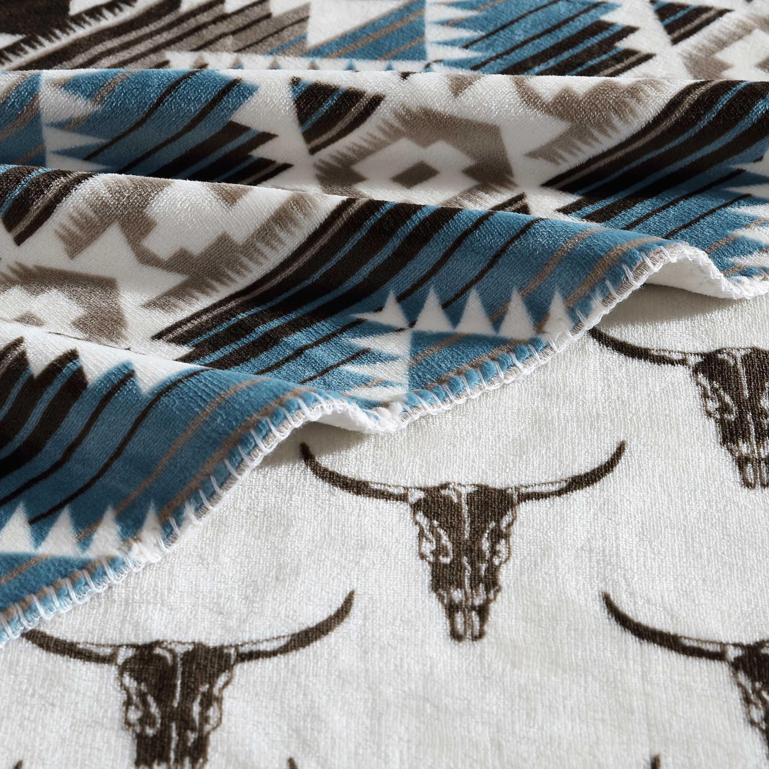 Wrangler folded throw stacked to show size and easy storage benefit