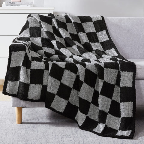 WRENSONGE folded throw on couch showing check pattern and cozy appeal