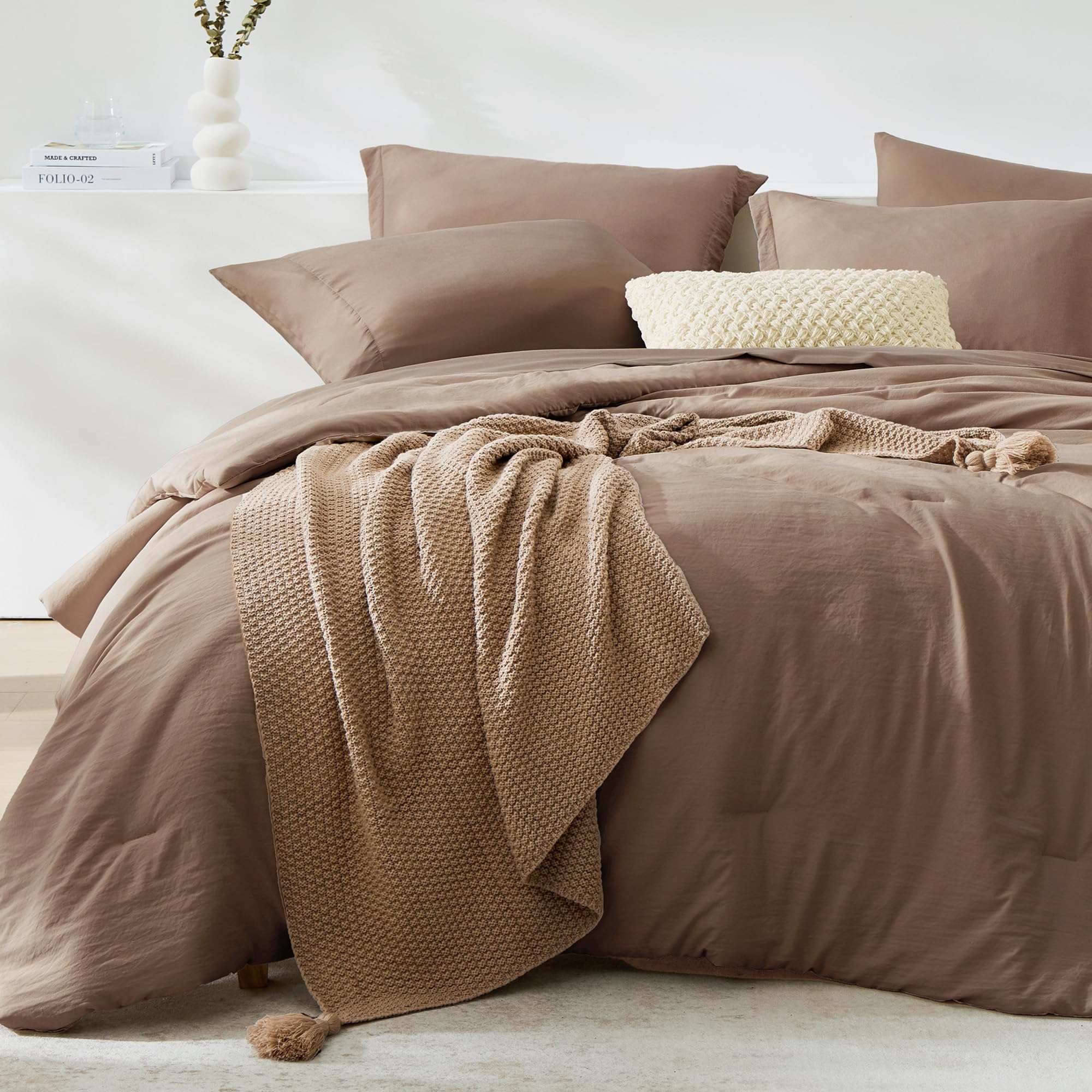 WRENSONGE comforter front view showing clean minimalist look and versatile styling