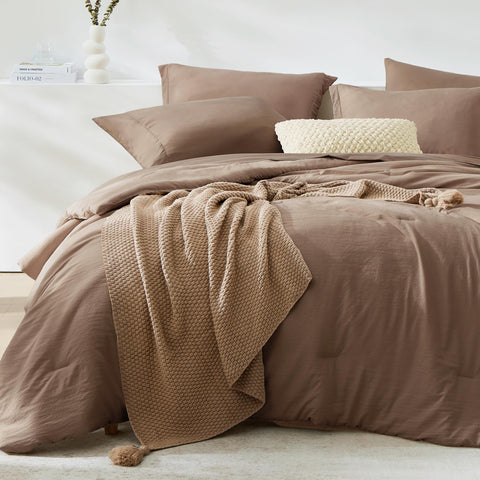 WRENSONGE comforter front view showing clean minimalist look and versatile styling