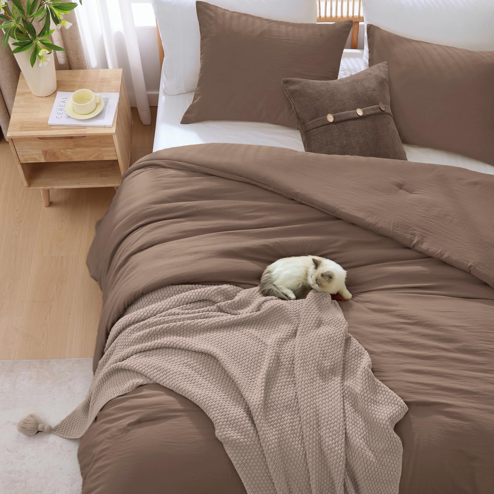 WRENSONGE lifestyle scene reading nook with comforter showing cozy modern appeal