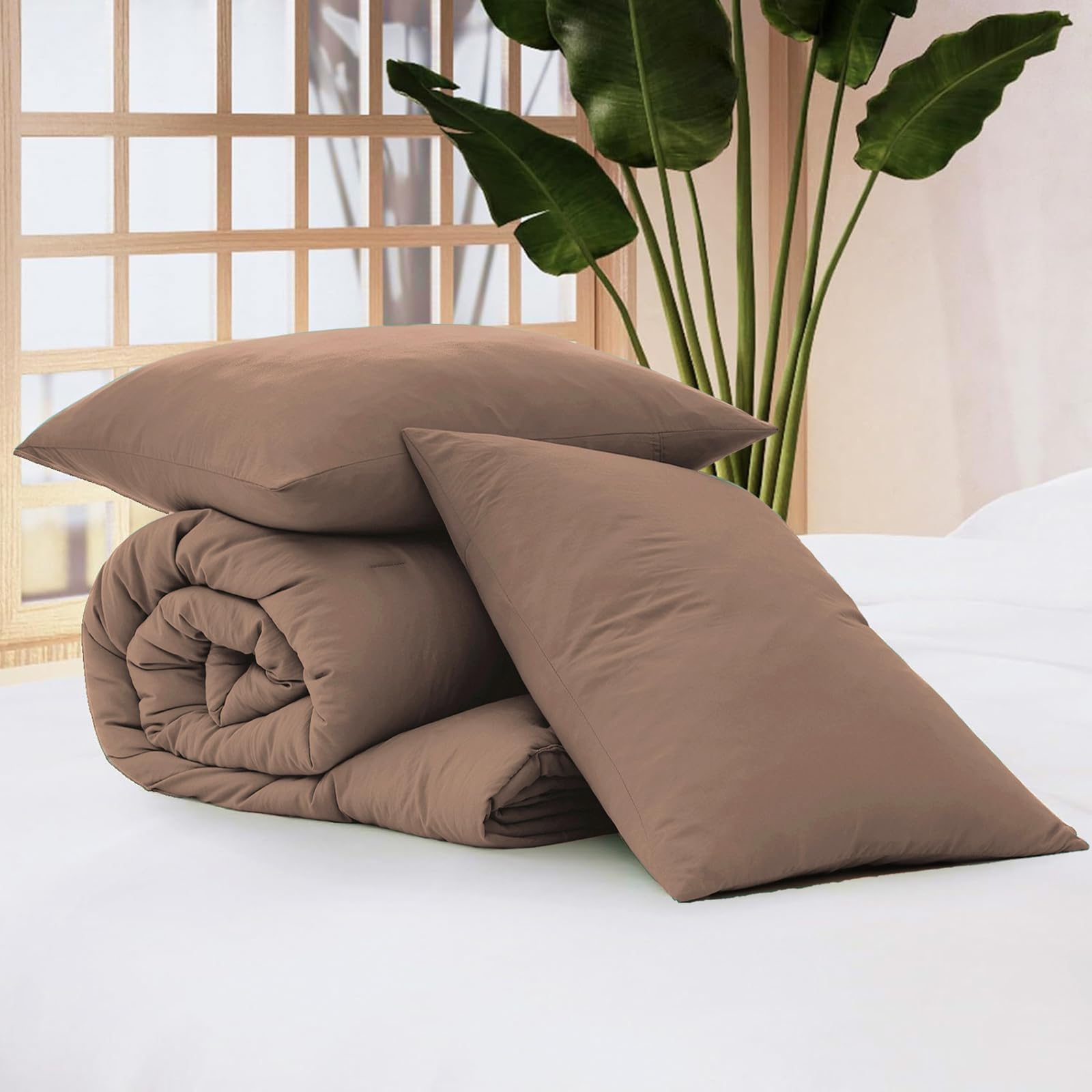 WRENSONGE comforter on queen bed illustrating generous coverage and proportion