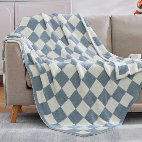 WRENSONGE folded throw with ribbon shows gift-ready presentation
